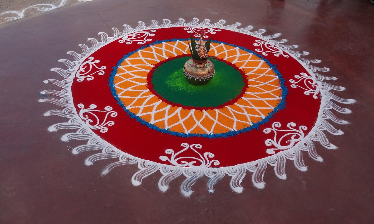 Coloured rangoli laid at an Indian house entrance for a festival