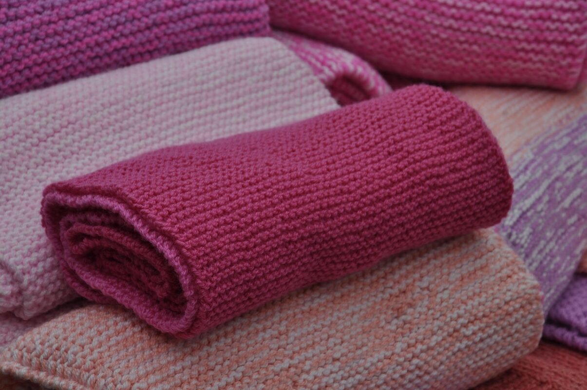 Folded fabric decoration stacked for storage between festivals